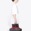 Ανδρικό πουλόβερ Balenciaga με στρογγυλό λαιμό, κοντό μανίκι και τύπωμα λέξεων, λευκό 641614TJVI39040