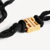 Γυναικείο κολιέ τύπου choker με νανοκορδέλα σε μαύρο/γυαλιστερό χρυσό