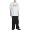 Metallica T-shirt με κοντά μανίκια και φαρδιά γραμμή “White Orange” 694576TMV880901